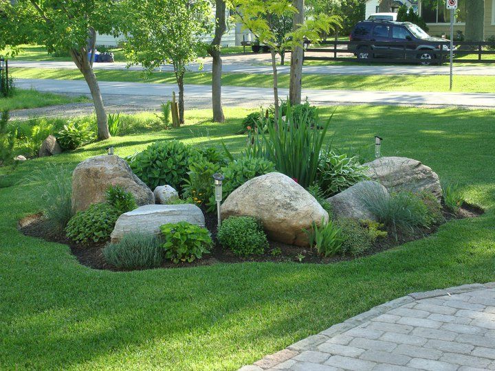 Boulder Cost Guide: Landscape Boulder Pricing & Installation (2025)